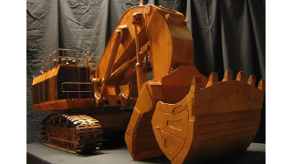 Illustration for article titled This Wooden Excavator Won't Demolish a House but Its Details Will Blow Your Mind